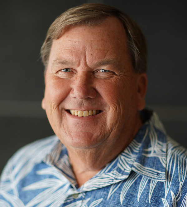 Robert Roper Smiling Wearing Blue Hawaiian Shirt